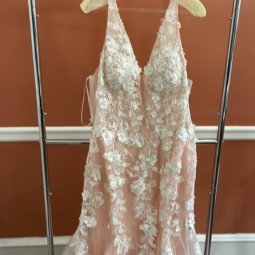 Gorgeous prom blush colored gown. Never worn due to COVID shutdown. Jovani gown.